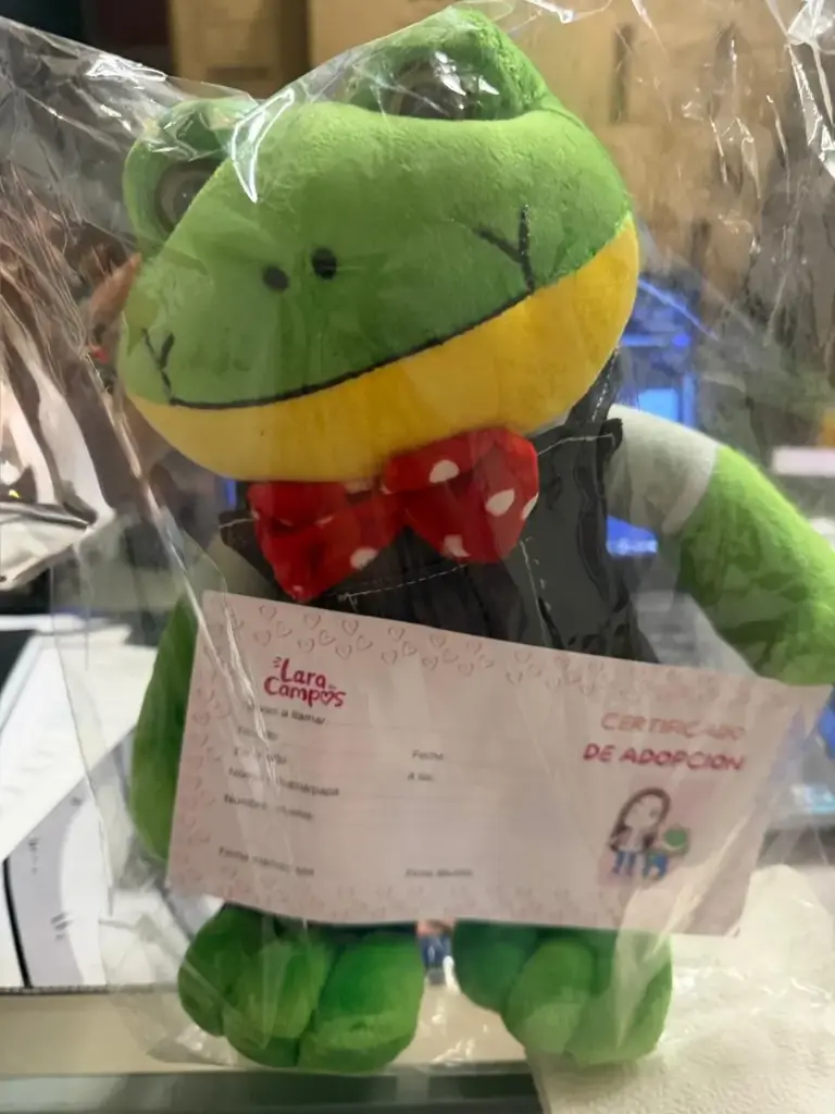 Peluche Rana Rhenné con mochila